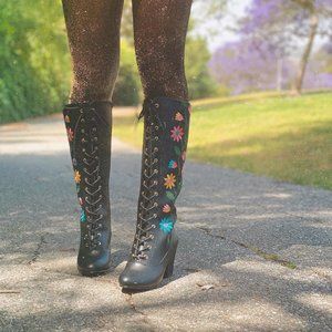 Knee high lace up boots with floral embroidery